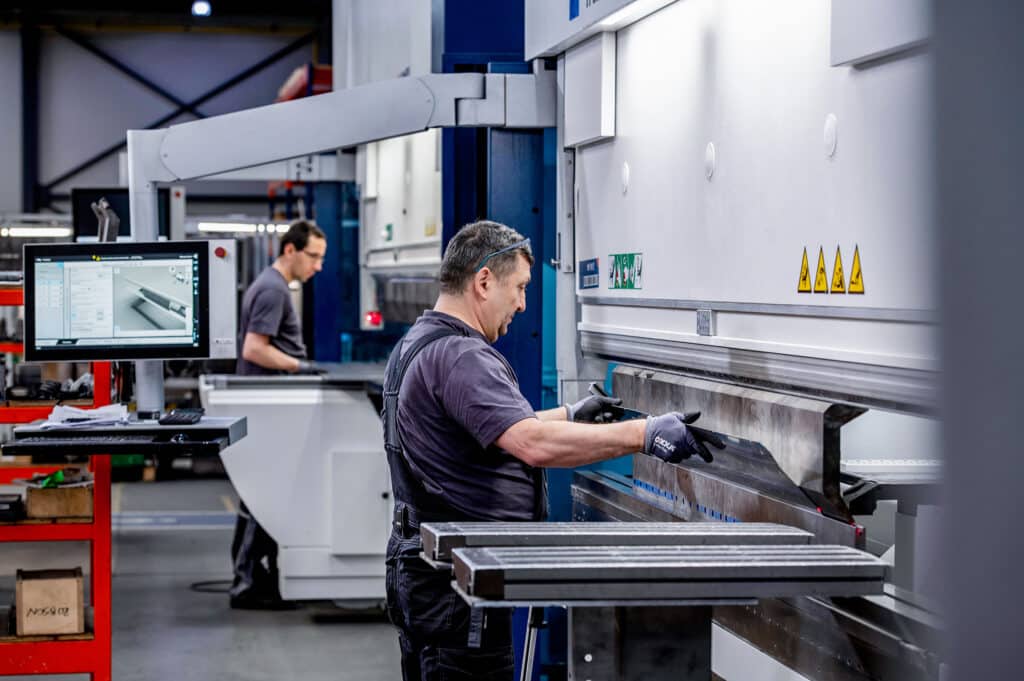 tummers medewerkers aan het werk